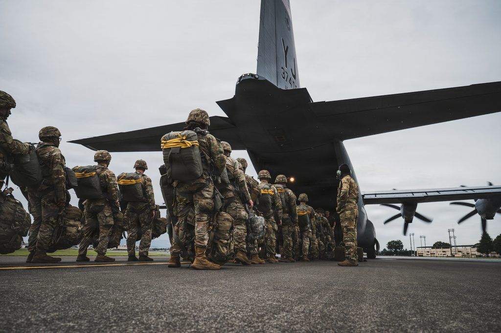 US Army paratroopers assigned to the 11th Airborne Division board a US Air Force C-130J Super Hercules, assigned to the 36th Airlift Squadron, for airdrop training in support of Orient Shield 2026, at Yokota Air Base, Japan, Sept. 15, 2026. (US Air Force photo by Senior Airman Cayla Hunt.)